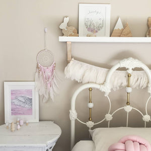 Wreath with wild flowers and pink angel wing displayed in sweet girls bedroom. Scandi decor inspiration with hand made products from Instagram. Watercolour paintings from Australian artist.